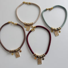 Collana laccio e charms