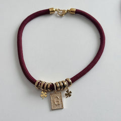 Collana laccio e charms