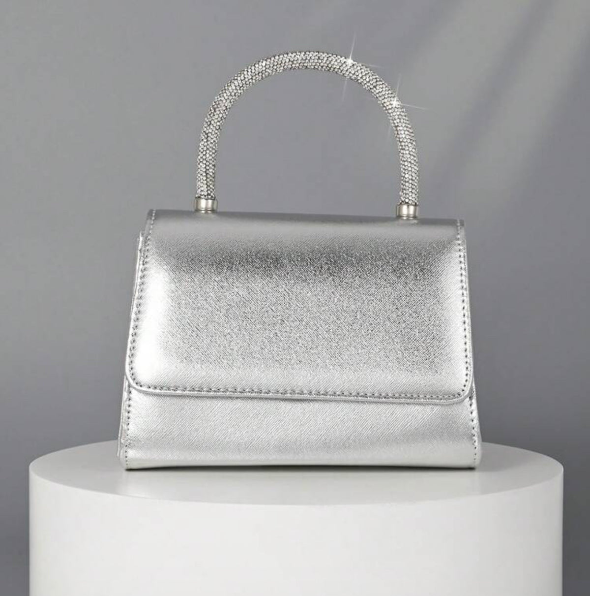 Clutch argento