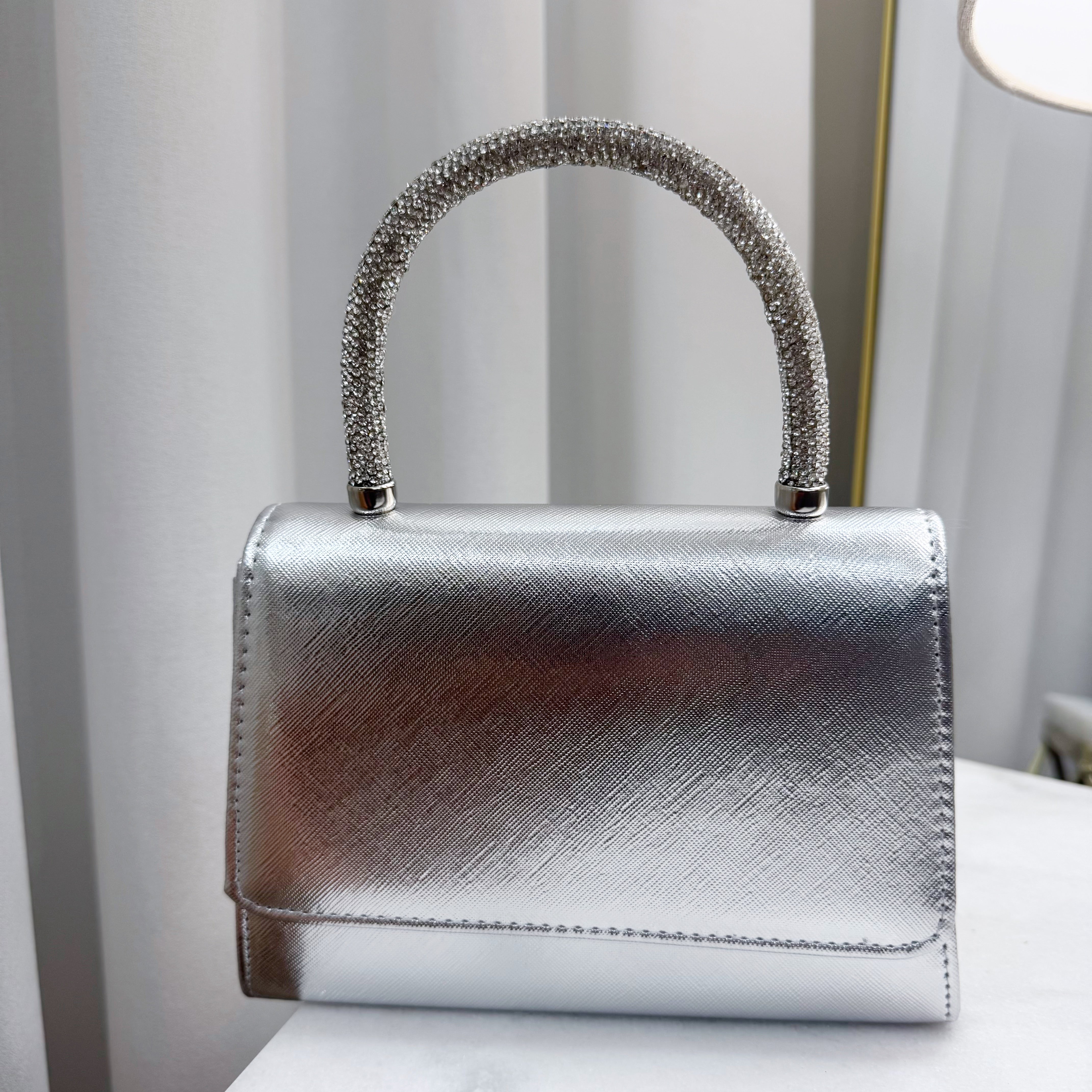 Clutch argento