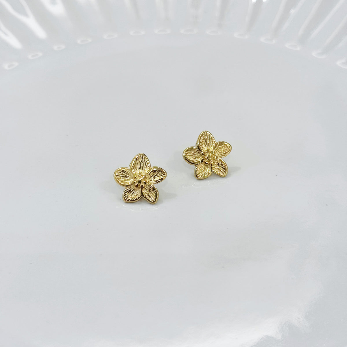 Orecchini mini fiore